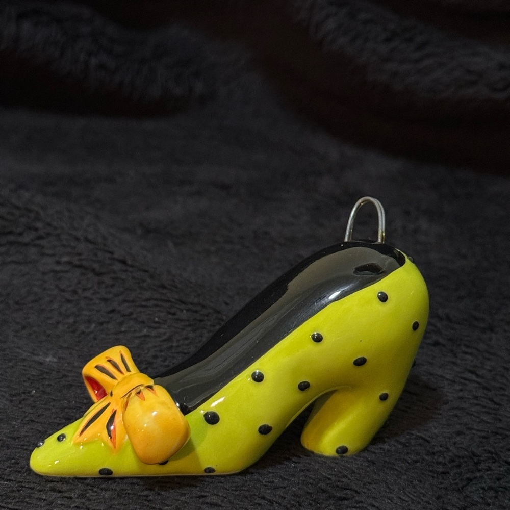 Green miniature porcelain high heel shoe with Bow Accent.